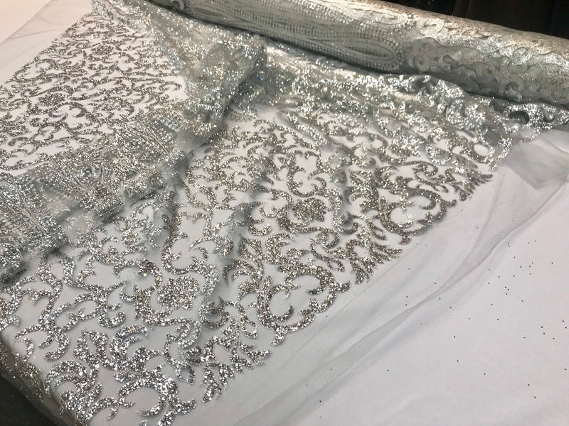 Silver shiny glitter damask design on a mesh lace-dresses-fashion-apparel-prom-nightgown-decorations-sold by the yard.