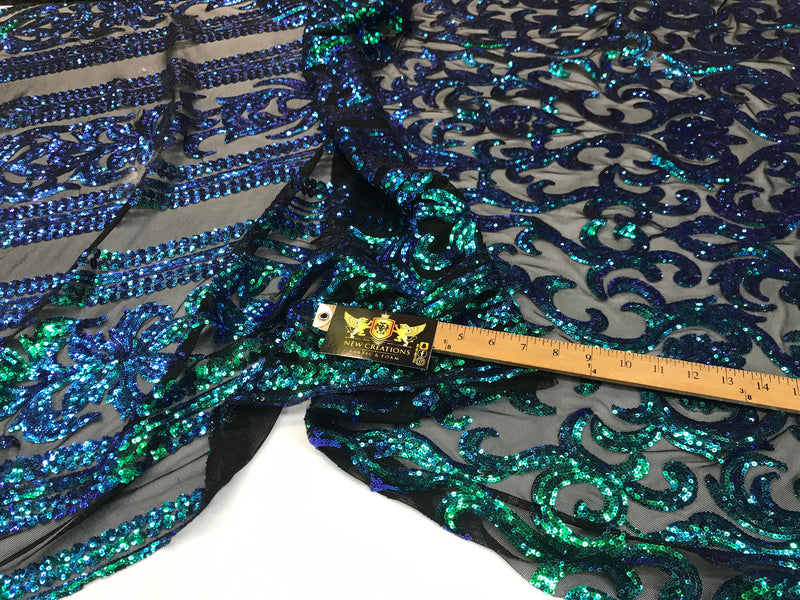 Green iridescent sequin classic design on a 4 way stretch black mesh fabric-prom-nightgown-sold by the yard-free shipping in the usa.