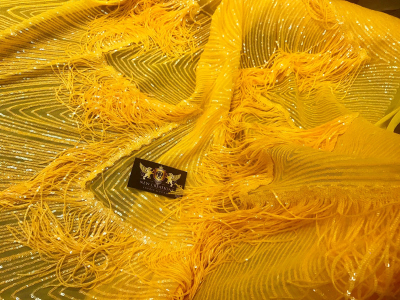 NEW!!!Dark yellow iridescent fringe sequins design on a 4 way stretch mesh fabric-sold by the yard.