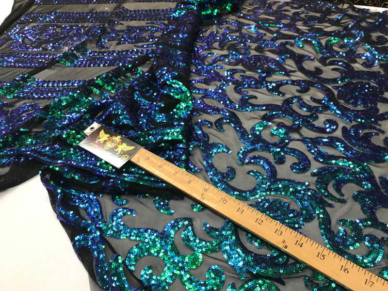 Green iridescent sequin classic design on a 4 way stretch black mesh fabric-prom-nightgown-sold by the yard-free shipping in the usa.