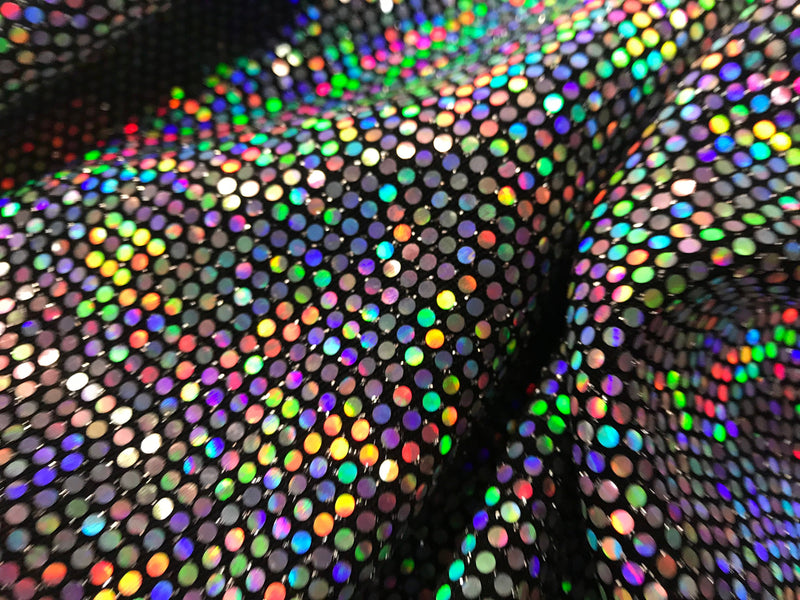 silver iridescent hologram round sequins on a metallic black spandex-sold by the yard-free shipping in the usa.