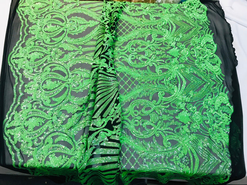 Neon green iridescent shiny sequin damask design on a black 4 way stretch mesh-sold by the yard.