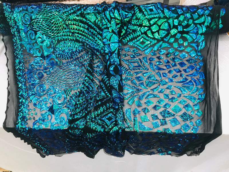 New green/blue iridescent diamond design with sequin on a black 4 way stretch mesh-sold by the yard