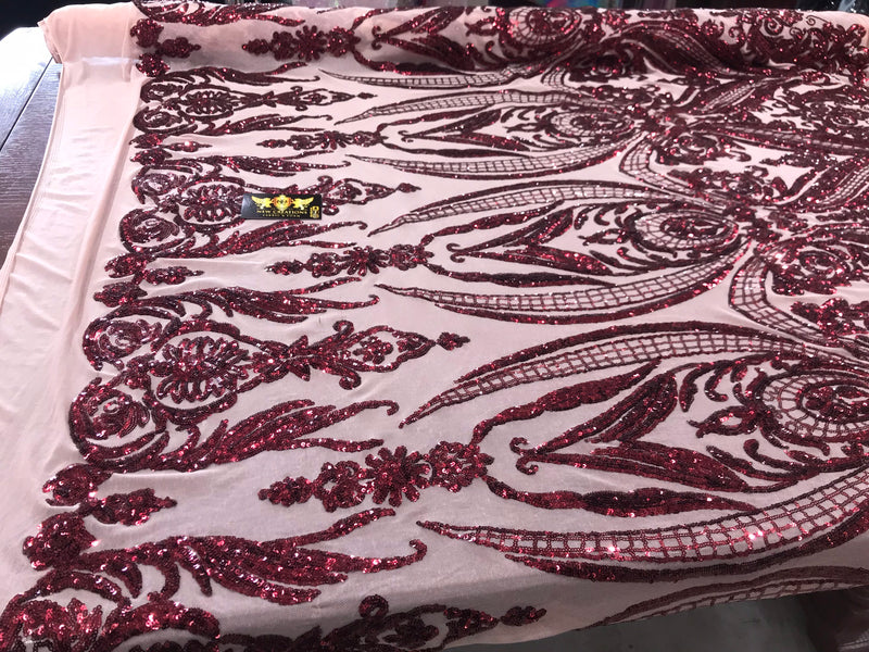 Burgundy big damask sequin design on a nude 4 way stretch mesh-sold by the yard.