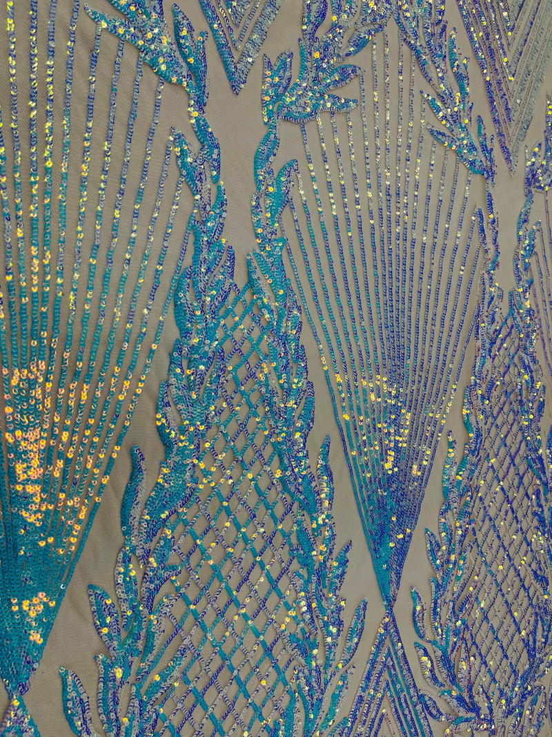 Aqua diamond design with shiny iridescent sequins on a nude 4 way stretch mesh-sold by the yard.