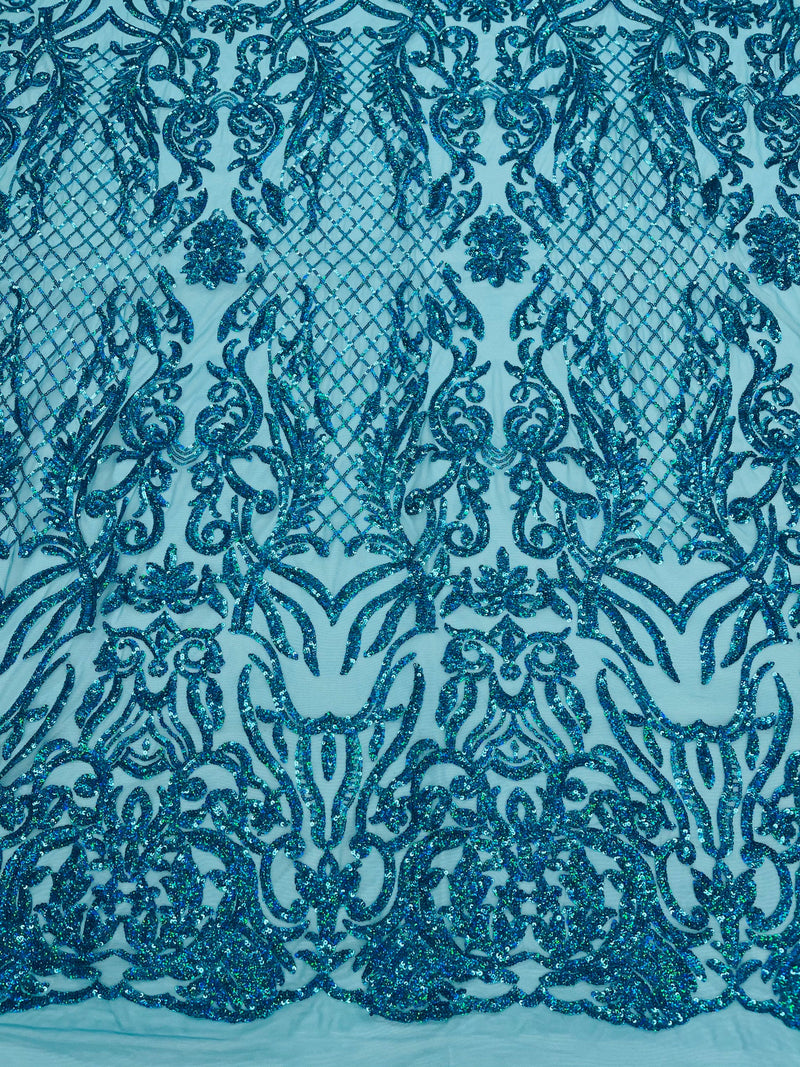 Turquoise iridescent shiny sequin damask design on a 4 way stretch mesh-prom-sold by the yard.