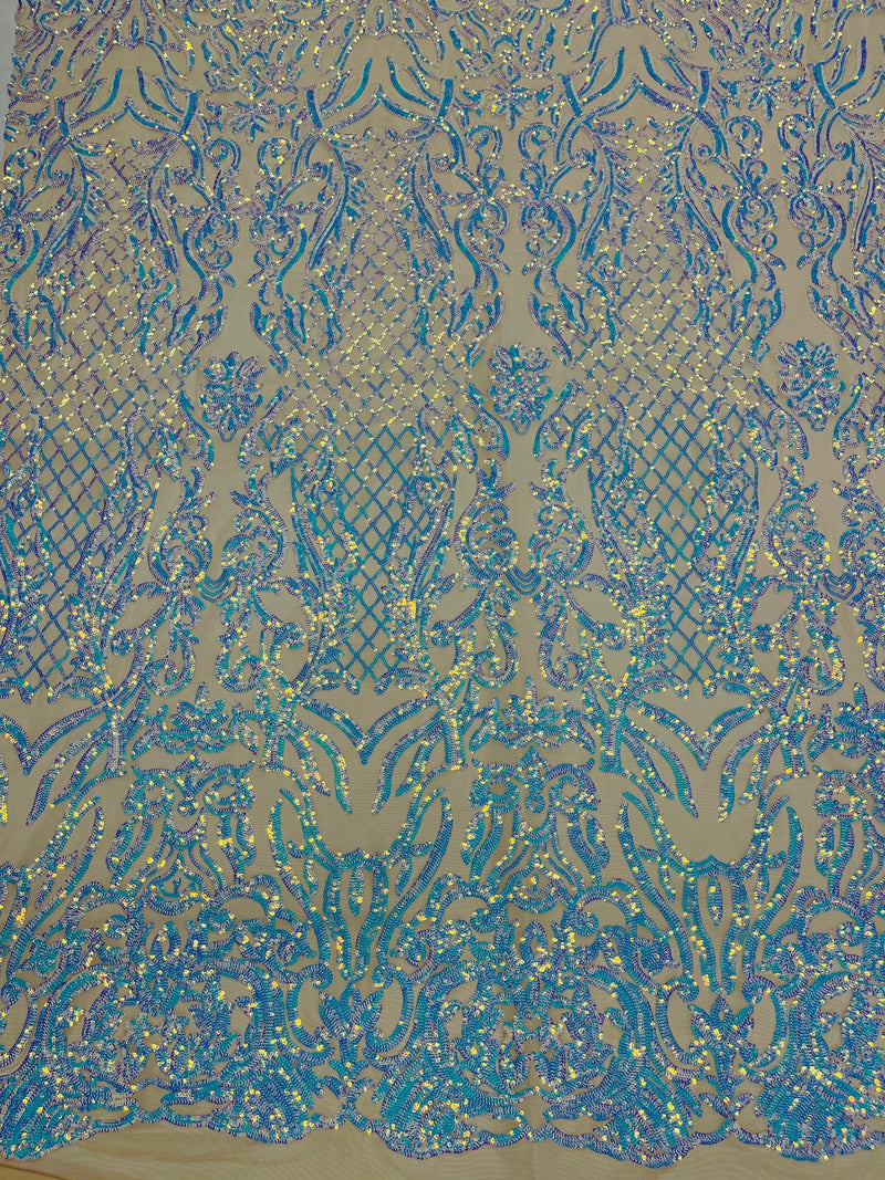 Aqua iridescent shiny sequin damask design on a nude 4 way stretch mesh-prom-sold by the yard.