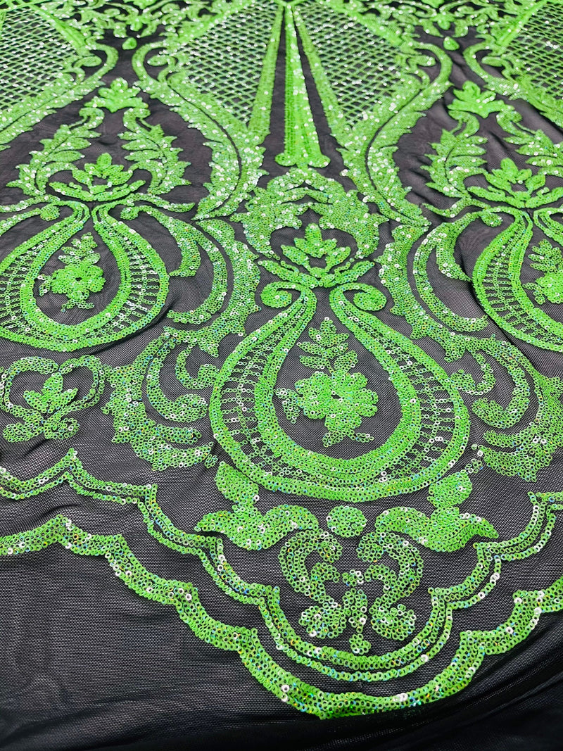 Neon green princess design iridescent sequins on a 4 way stretch black mesh-sold by the yard.