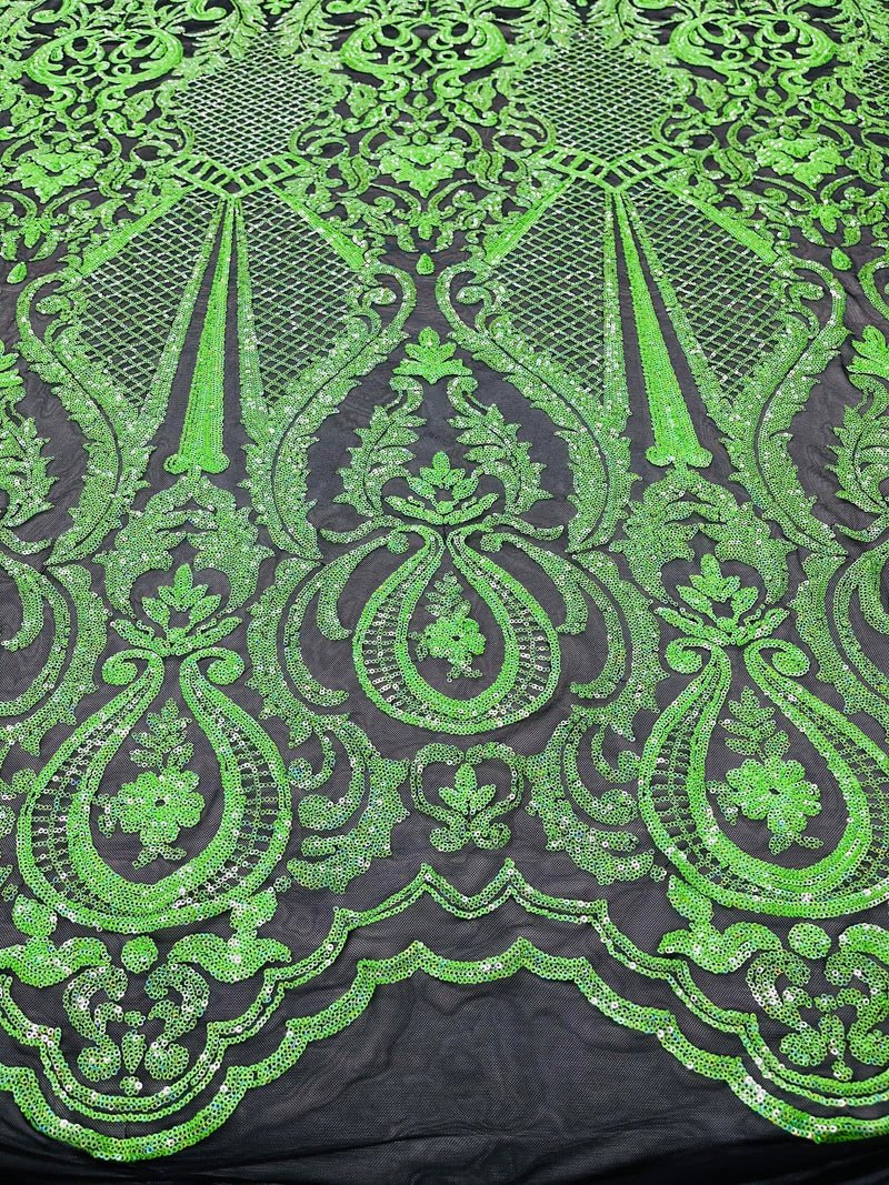 Neon green princess design iridescent sequins on a 4 way stretch black mesh-sold by the yard.