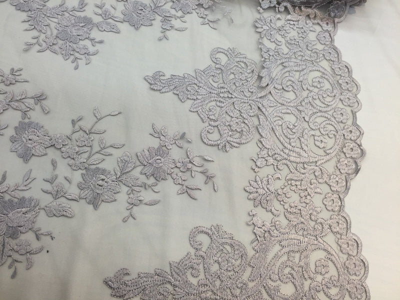 Silver/gray flowers embroider on a 2 way stretch mesh lace. Wedding/Bridal/Prom/Nightgown fabric-apparel-dresses-fashion-Sold by the yard.