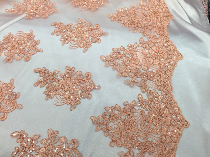 Peach flower lace corded and embroider with sequins on a mesh.wedding/bridal/prom/nightgown fabric. Sold by the yard.