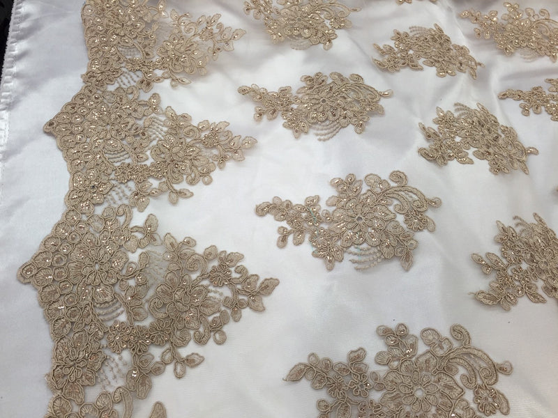 Taupe flower lace corded and embroider with sequins on a mesh. Wedding/bridal/prom/nightgown fabric. Sold by the yard.