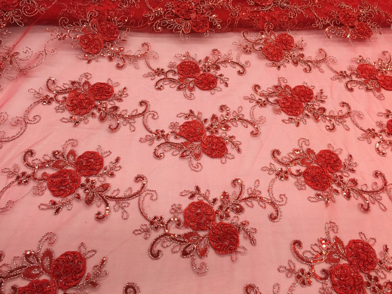 Red/silver  3d flowers embroider with sequins on a mesh lace fabric. Sold by the yard.