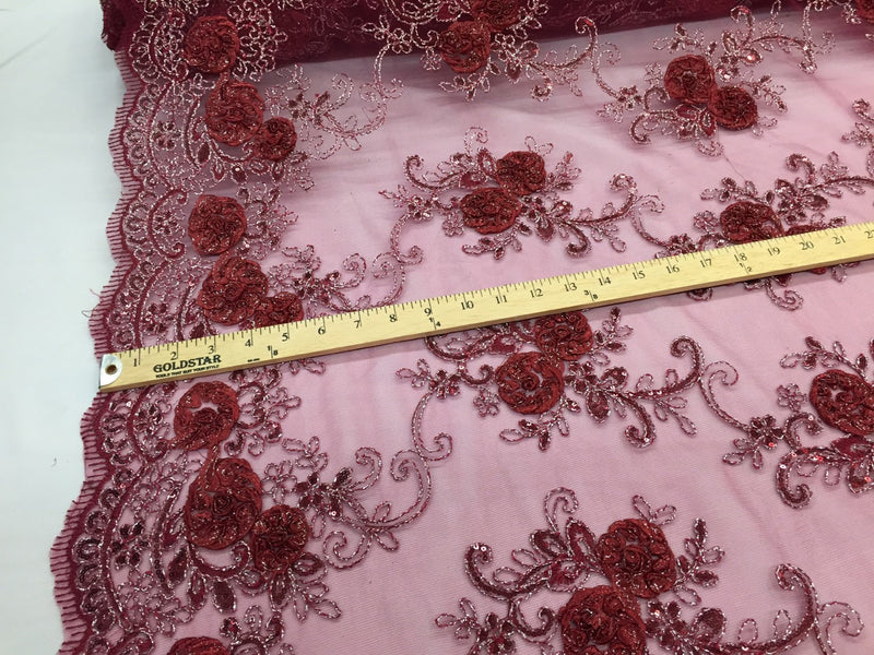 Burgundy 3d flowers embroider with sequins on a mesh lace fabric. Sold by the yard.