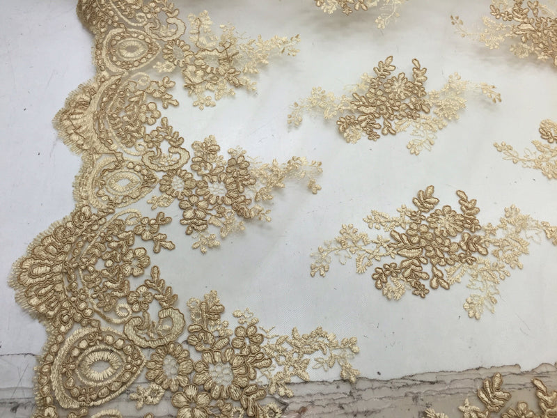 Gold flowers embroider on a mesh lace- wedding-bridal-prom-nightgown-dresses-apparel-fashion-decorations-sold by the yard.