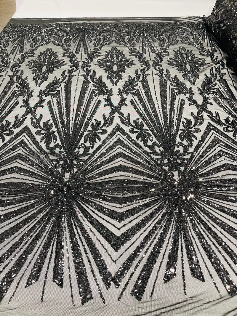 Black sequin damask design on a 4 way stretch mesh- sold by the yard.