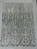 Paisley sequin design on a nude 4 way stretch mesh-prom-sold by the yard.