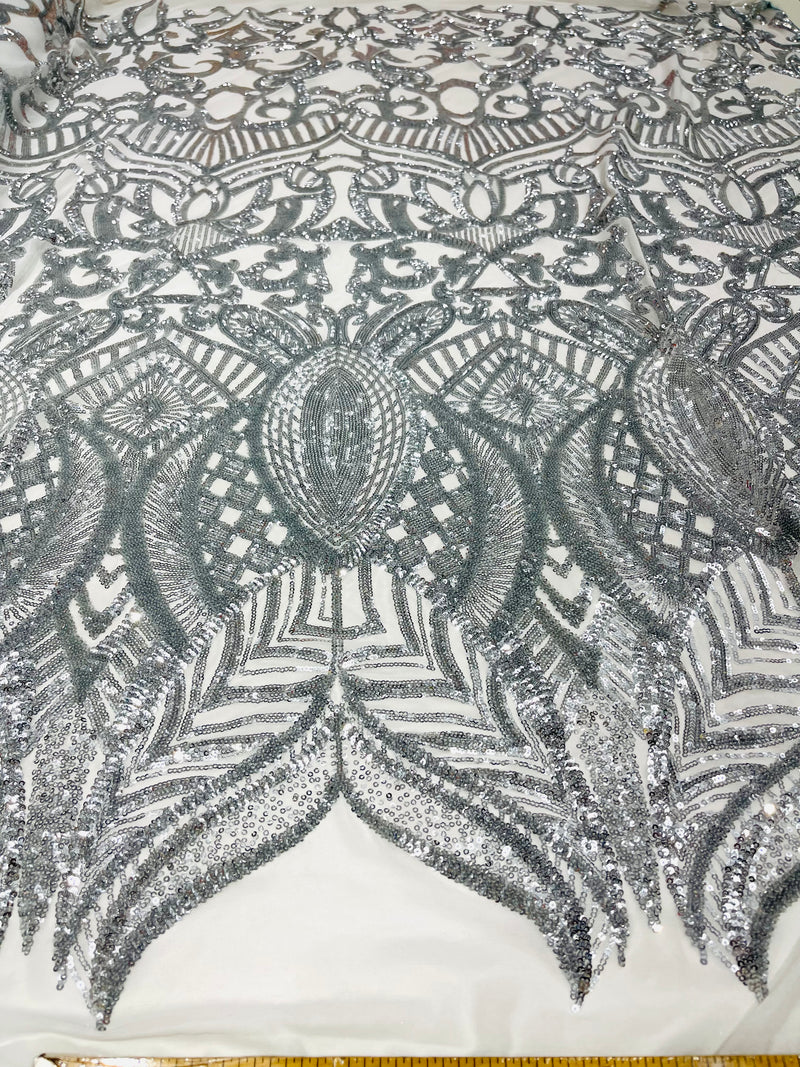 Silver royalty design on a white 4 way stretch mesh-prom-sold by the yard.