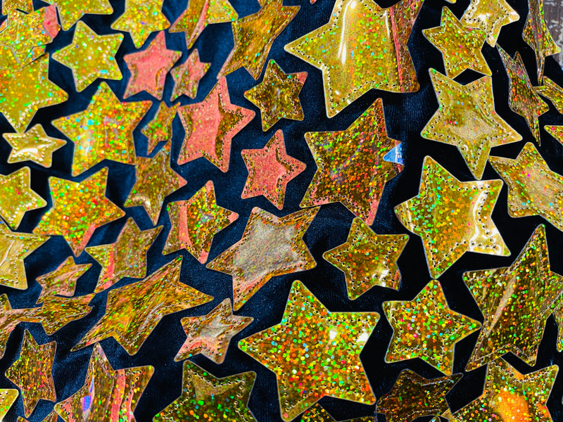 Gold hologram Iridescent sequin Stars On Black Stretch Velvet Fabric Sold By The Yard.