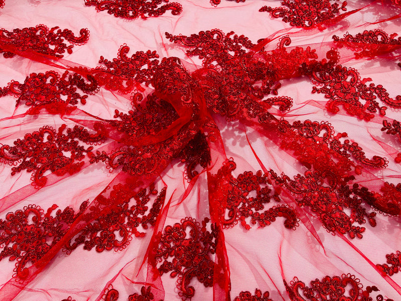 Red metallic floral design embroidery on a mesh lace with sequins and cord-sold by the yard.