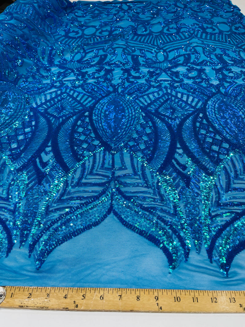 Turquoise iridescent royalty design on a 4 way stretch mesh-prom-sold by the yard.