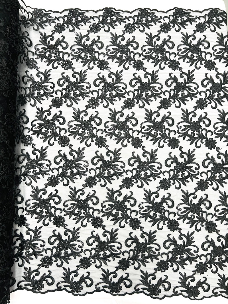 Estrella corded flowers embroider with sequins on a mesh lace fabric-sold by the yard.