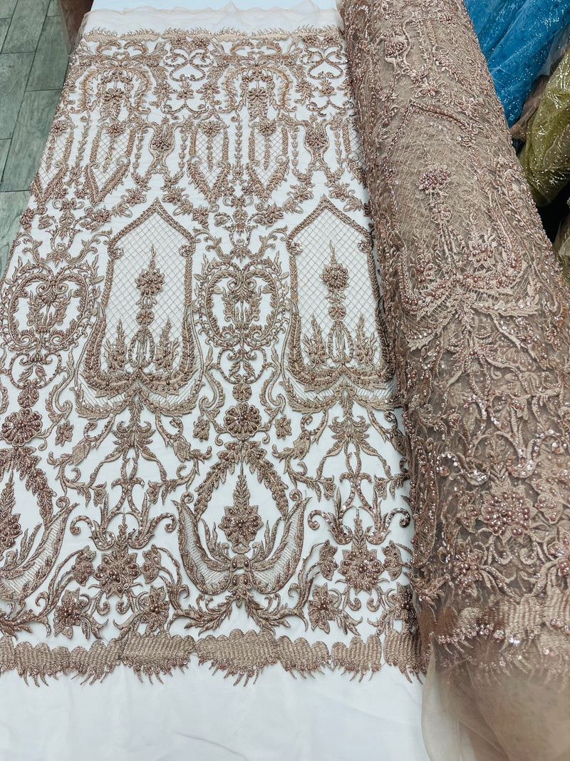 Diva design damask embroidery with heavy beaded on a mesh lace-sold by the yard.