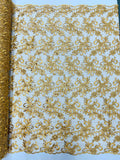 Estrella corded flowers embroider with sequins on a mesh lace fabric-sold by the yard.