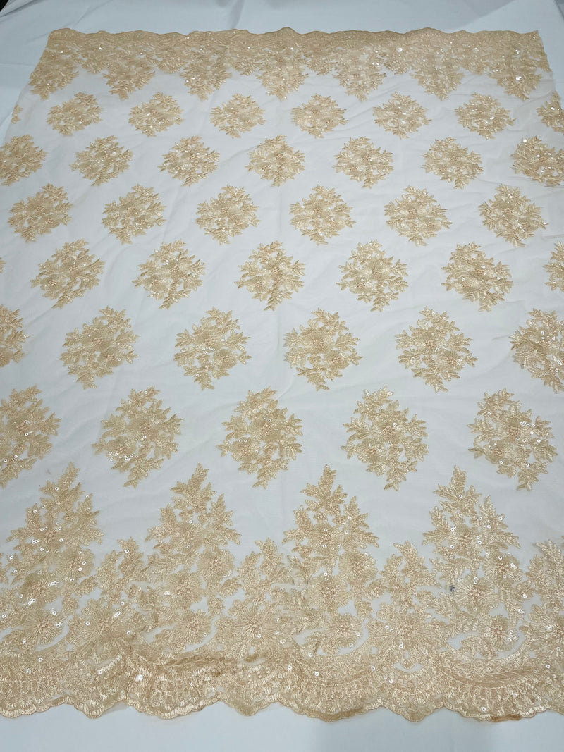 Floral corded embroider with sequins on a mesh lace fabric-sold by the yard