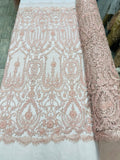 Diva design damask embroidery with heavy beaded on a mesh lace-sold by the yard.