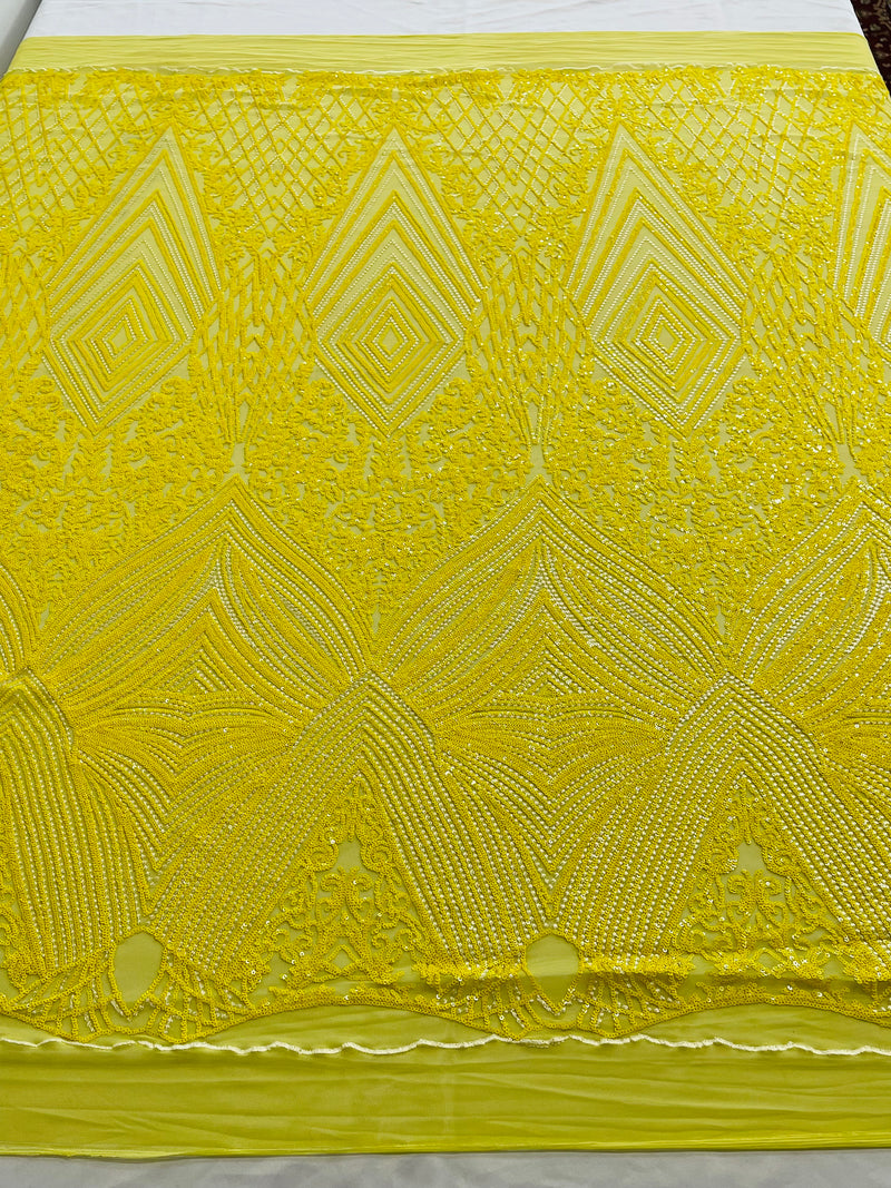 Queens geometric diamond design with shiny sequins on a 4 way stretch mesh fabric- sold by the yard.