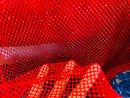 AB Rhinestones on a fish net fabric | New Creation Fabric & Foam Inc.