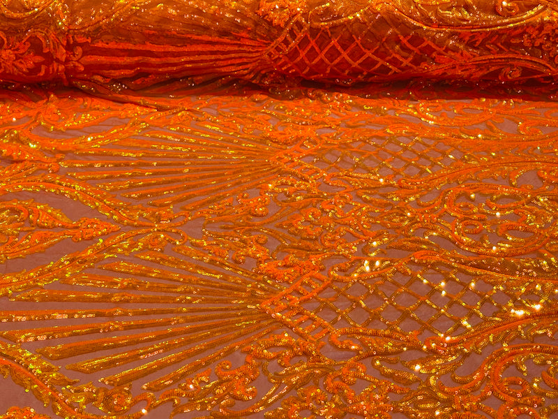 Orange iridescent sequin damask design on a 4 way stretch mesh- sold by the yard.