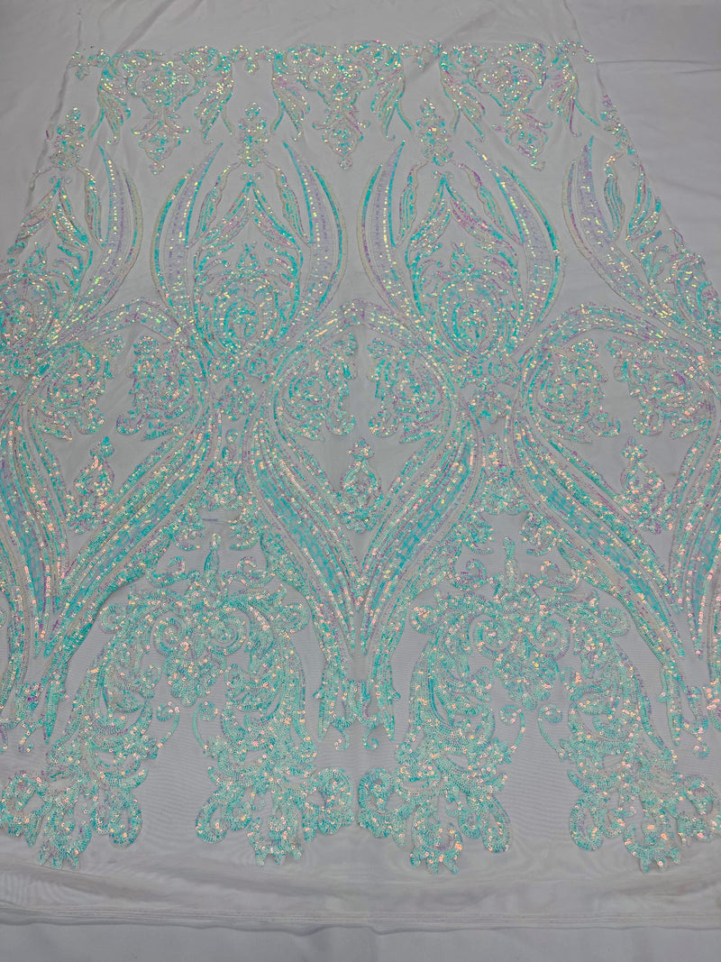 Empire Damask design with sequins embroider on a 4 way stretch mesh fabric-sold by the yard.