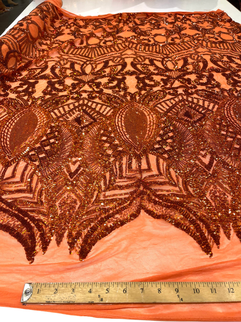 Burnt Orange iridescent royalty design on a 4 way stretch mesh-prom-sold by the yard.