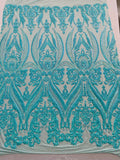 Empire Damask design with sequins embroider on a 4 way stretch mesh fabric-sold by the yard.