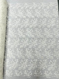 Estrella corded flowers embroider with sequins on a mesh lace fabric-sold by the yard.