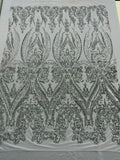 Empire Damask design with sequins embroider on a 4 way stretch mesh fabric-sold by the yard.