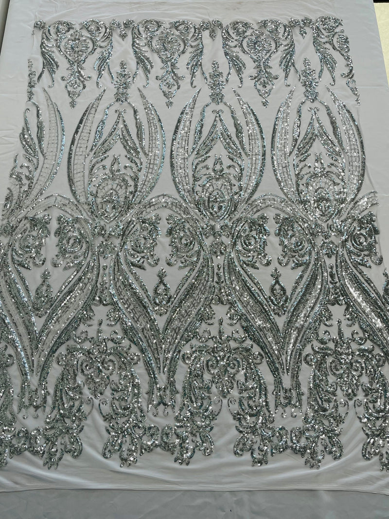 Empire Damask design with sequins embroider on a 4 way stretch mesh fabric-sold by the yard.